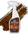 Straight Forward Cabinet And Wood Cleaning Spray Powered By Real Beeswax Furniture Polish in a 23 oz pump bottle with wooden background.