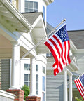 2 Pack Flag Pole Rings, Slick Spinning One Inch Clips Cut Wrapping Stress, Rock Solid Aluminum Steel Hardware, Easy Slide Snap Carabiners Make Outdoor Flag Setup A Quick Breeze For 0.75 1.02 Inch Poles, American flag displayed on front porch.
