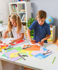 Children using 24 Pack Handheld One Hole Punches, No Fuss One Quarter Inch Six Millimeter Metal Paper Puncher For Tags, Tickets, Labels