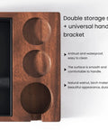 Wooden Coffee Tamping Stand Station 4 In 1 Tamper Holder with storage slot, made of walnut and birch, shown close-up.