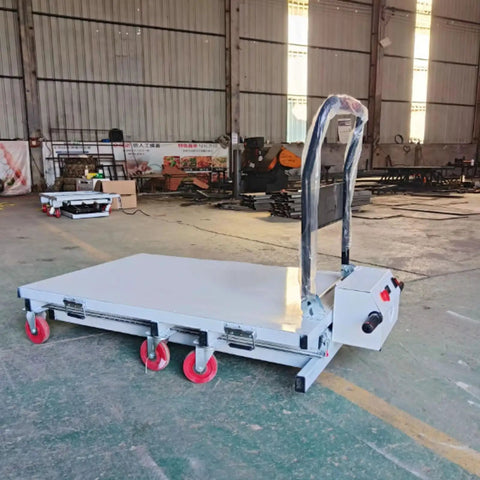 Heavy Duty Hydraulic Forklift And Electric Scissor Lift Table With Four Wheel Elevating Platform for cargo handling with wheels in warehouse.