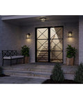 Two Light Outdoor Flush Mount Light In Antique Bronze With Clear Glass Diffuser in covered patio entrance enhancing farmhouse vibe