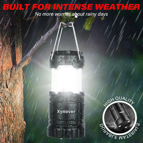 4 Pack Solar Camping Lanterns Rechargeable LED with USB solar and AA battery power in rain hanging on tree for emergencies
