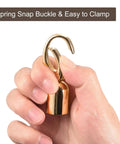 Person holding Gold Cord End Cap Set Of 8 For Tassel Jewelry Making And Bag Strap DIY with spring snap buckle.