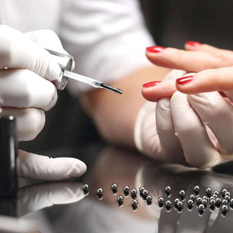 316 Stainless Steel Paint Mixing Balls For Nail Polish Beads 3mm 400 Pieces Pro Grade Heavy Duty High Temp Resistant And Corrosion Proof With Molybdenum For Tough Environments Go To DIY Cosmetic Mixing Beads used in a nail polish bottle near red-painted nails