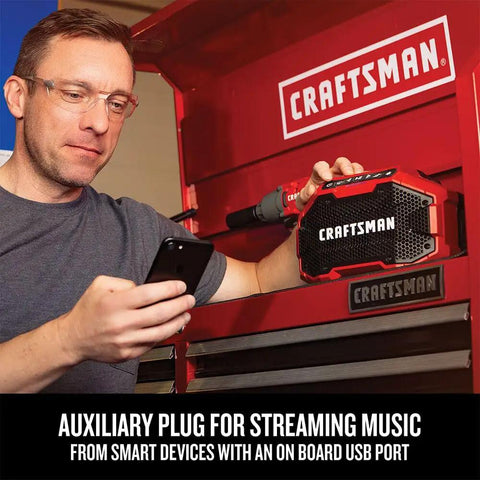 Man using V20 Wireless Bluetooth Speaker With Dual 3-Inch Stereo Drivers, Cordless Plug-In, 100 Ft Range Red Portable Speaker
