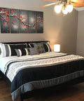 Bedroom with black and white theme, featuring Maxwell Bedside Lamp with USB Port on nightstands, wood frame, cozy LED glow.