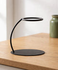 Heavy Duty Coffee Filter Holder Funnel Stand With Slick Black Iron Base For Hands Free Drip Pour Over Brewing on wooden table