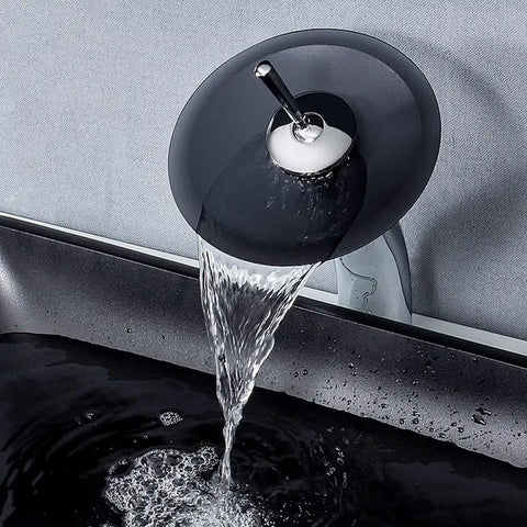 Slick Black Tempered Glass Countertop Vessel Sink For Bathroom Above Counter No Sweat Install Drip Free Retro Design Smooth Wash Basin Home Run Plumbing Setup with water flowing from tap.