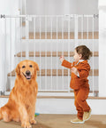 Child and dog near 36 Inch Extra Tall Baby Gate For Stairs And Doorways, Expands From 29 To 42.5 Inch Wide, Auto Close Walk Through Pet Gate