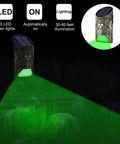 Heavy Hitter Solar Game Feeder Lights With Vibrant Green Motion Detection For Night Hunting And Feeding Deer Hogs Predators Coyotes And Varmints In A Smooth Two Pack Field Ready Kit cast in green light in a dark setting.