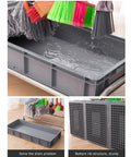 Stainless Steel Broom and Mop Organizer Rack with Five Racks and Six Hooks, Heavy Duty Floor Mounted Mop Holder showing drainage tray and brooms.