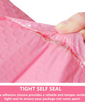 Close-up of someone sealing a pink bubble mailer showing the tight self-seal adhesive on a 3.5 by 5.9 inch bubble mailers 12 pack