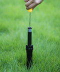 Using Sprinkler Head Adjustment Tool and Rotor Removal Kit on lawn sprinkler