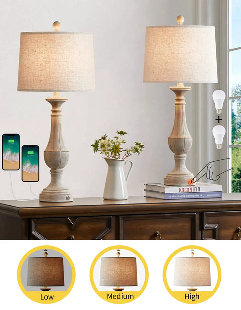 Farmhouse 3 Way Dimmable Touch Table Lamps Set of 2 with USB Ports for Nightstand Living Room and Bedroom Washed White Cozy Rustic Bedside Lamps For Any Room shown on dresser with books and charging phones
