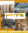 Built Like A Tank 6600 Lb Forklift Telescopic Jib Boom With Zero To Seventy Five Degree Adjustable Tilt featuring a yellow steel frame in a warehouse setting.