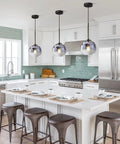 Modern Black Globe Pendant Light With Mercury Glass Shade in a kitchen setting