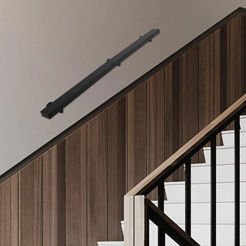 Heavy Duty Stainless Steel Wall Mount Handrail With Sick Grip For Stairs And Bathroom Walls mounted on a wall near wooden stairs.