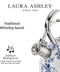 Close-up of a stainless steel stovetop kettle with a floral design, whistle, and cool-touch handle, showcasing its whistling feature.