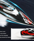 Eighteen Inch Brushless RC Speed Boat With Two Four GHz Remote Control at high speed on water, showing protective cover detail