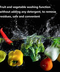 Fresh fruits and vegetables being washed, highlighting the fruit wash feature of the Compact Countertop Dishwasher With Fruit Wash Feature And Rapid Dry Cycle Slick Touch Panel For Apartments Dorms And Small Rooms Straight Up Hassle Free Cleanup.