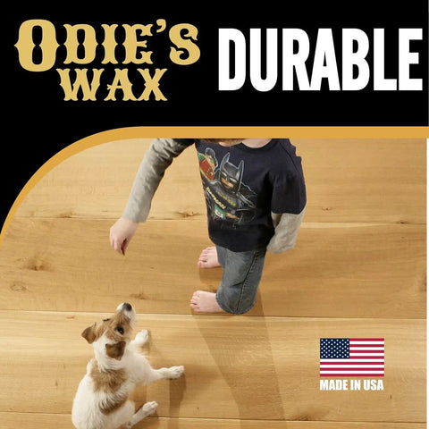Child and dog on floor showcasing Super Hard Wood Wax For Ultra Durable Finish And Extra Lustrous Sheen That Builds On Super Duper Oil And Wood Butter Great For Lighter Woods Clear Wax Finish 9 Ounce Glass Jar effect, Made in USA label visible.
