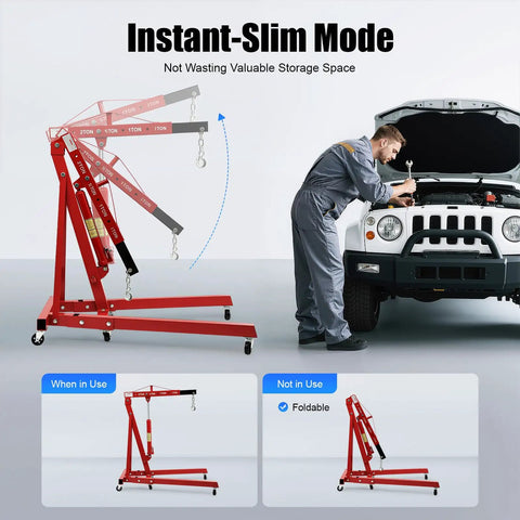 Heavy Duty Hydraulic Engine Hoist, 2 Ton Folding Shop Crane built tough, shown in use lifting a vehicle engine with adjustable arms.