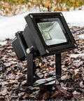 LED flood light mounted on metal ground stake for 10W to 100W outdoor use in gardens and landscapes