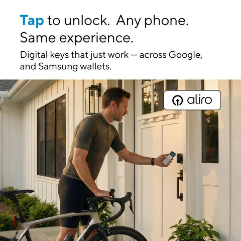 A man unlocking a smart door lock with a smartphone while holding a bicycle, showcasing modern digital access options.