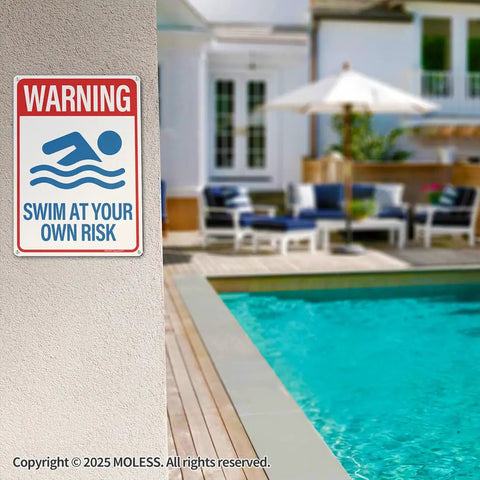 Two Pack Pool Safety Signs Bundle 14x10 Outdoor Pool Signs Stay Safe By The Pool Watch Your Kids Swim At Your Own Risk Weatherproof 0.040 Aluminum Easy To Mount Durable For Backyard Pools PSP-2403 mounted on a wall near a pool.