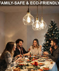 Grab Ultra Bright E12 LED Bulbs illuminate a family dining room decorated for Christmas with a tree and festive table setup.