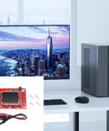 Fully Assembled Digital Oscilloscope Kit With ARM Cortex M3 Processor And 2.4 Inch Color TFT Display next to a desktop setup