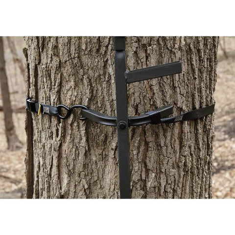Extra Long Tree Climbing Stick Ladder For Deer Hunting Up To 25 Feet Durable Climbing Gear attached to tree trunk