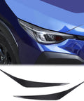 Subaru Crosstrek front headlight with carbon fiber eyebrow trim strips for 2024 2025 model, enhancing fog lamp and exterior look.