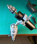 Rock Solid Workhorse Electric Leather Burnisher And Bench Polish Machine Featuring Dual Voltage Grind Buff Tool mounted on workbench.