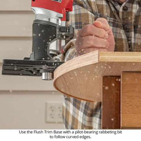 Close-up of a Heavy Duty Flush Trim Router Base Plate in use on a wood edge, showcasing curved trimming ability.