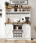 Premium White Farmhouse Coffee Bar Cart With Sliding Barn Doors Open Storage Hutch Integrated Wine Rack Solid Wood Serving Counter Top Station with decor and coffee supplies.