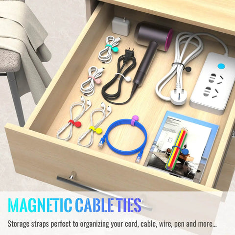 Magnetic Cable Ties 10 Pack Reusable Cable Organizers for Earbuds and Cords neatly arranged in a wooden drawer with other accessories.