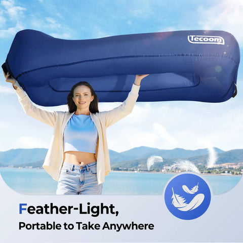 Woman holding Inflatable Lounger Couch Air Sofa Hammock No Pump Needed 20 Second Inflation Waterproof Beach Chair for outdoor use.