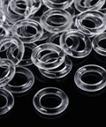 100 Piece Clear Plastic Roman Shade Rings Hella Smooth Glide 13Mm Cord Guides on a black surface, showcasing their transparent design.