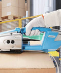 Electric Handheld Welding Strapping Machine For Pet And Pp Straps Portable Automatic Baler Tool With Tensioner Fast Seal Easy Use Heavy Duty Binding Supply in use on cardboard box.