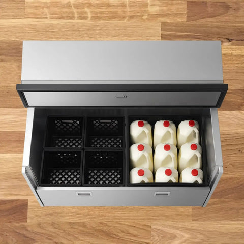 Rock Solid Double Sided Milk Cooler Built Tough For School Cafeterias Featuring Slick Sliding Doors And Premium Stainless Steel Construction Holding Up To Sixteen Crates For Seamless Everyday Kitchen Grind And Quick Cleanup with milk containers visible.