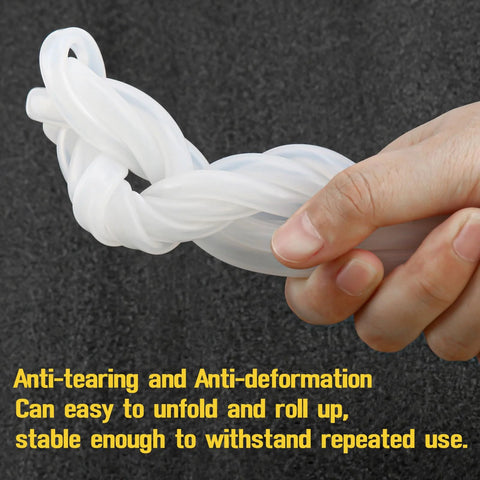 White silicone pressure tubing, 3/16 in ID, held in hand.