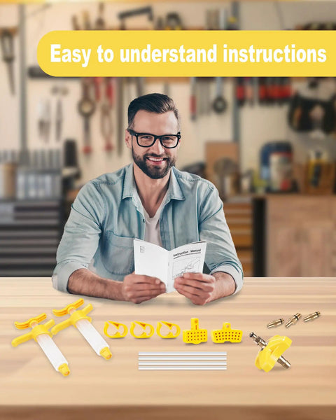 Man reading instructions with SRAM And Avid Hydraulic Disc Brake Bleed Kit components on table in workshop