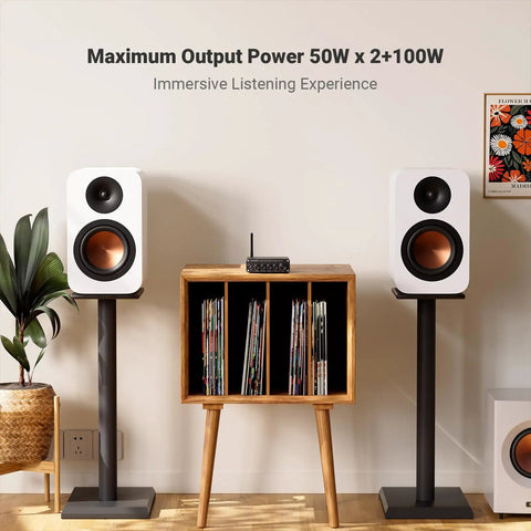 Living room setup featuring speakers and BT30D Bluetooth 5.0 2.1 Channel Stereo Receiver Amplifier Mini Hi Fi Class D Integrated Amp.
