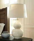 Cream Ceramic Table Lamp With Fabric Shade, Double Gourd Base, 3-Way Switch, UL Listed, Transitional Accent Lighting For Living Room Or Bedroom, 29.75 Inch Tall, Cozy Yet Classy next to a bed.