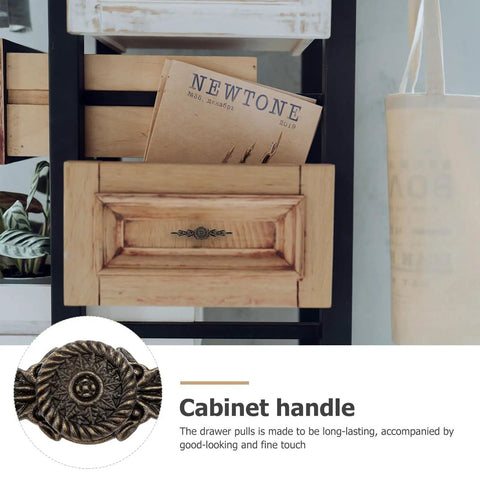 Old School Antique Style Zinc Alloy Cabinet Handles 6 Pack Medium Large Single Hole Drawer Pulls For Cabinets And Furniture Replacement Vintage Bronze Finish Hardware For Kitchen And Wardrobe Makeovers, shown on wooden drawer.