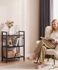 Dope Three Tier Industrial Bookcase With Metal Frame Black Finish in living room with decor, books, and a woman reading nearby.