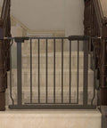 Narrow Baby Gate For Tight Doorways And Small Spaces Indoor Safety Gate With No Fuss Auto Close And Walk Through Design Sturdy Metal Pet Gate For Home Use Adjustable 29 To 34 Inches Black Fits Stairs And Door Openings installed on staircase