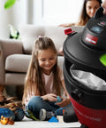10 To 14 Gallon Disposable Vacuum Filter Bags 6 Pack For Wet Dry Vacs Captures Fine Particles Like Drywall Cement Dust And Cold Ashes Premium Quality Easy To Replace Eco Friendly Dust Collection Bags shown in use with children playing in background.